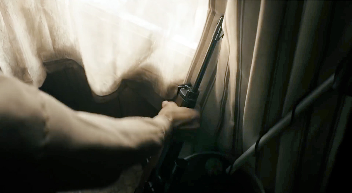 Brett Woodard (Michael Greyeyes) places his Ruger Mini-14 by the window in "The Hour and the Day" (S3E04).