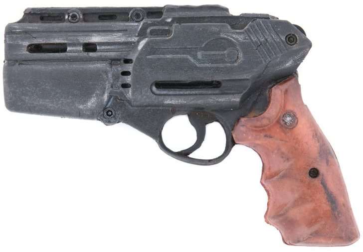 TV Series used rubber stunt gun casting of the firing Smith & Wesson 686 "clamshell" revolver. This version has the "wood" handgrips used by Kara "Starbuck" Thrace (Katee Sackhoff).