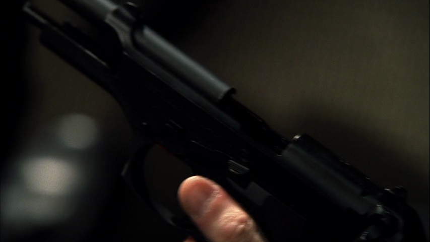 Horatio examines Wolfe's Beretta in 'Under the Influence' (S3E03).