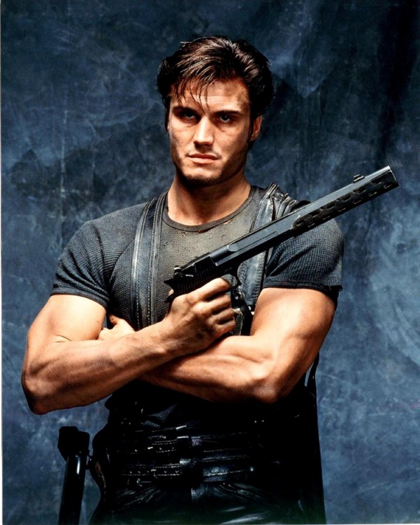 Promotional photograph of Frank Castle which gives a very clear shot of the modified Desert Eagle. This photograph was used on some of the posters (particularly German one) and a soundtrack cover.