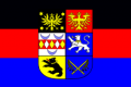 220px-Ostfriesland Flagge mit Wappen.0.2.svg.png