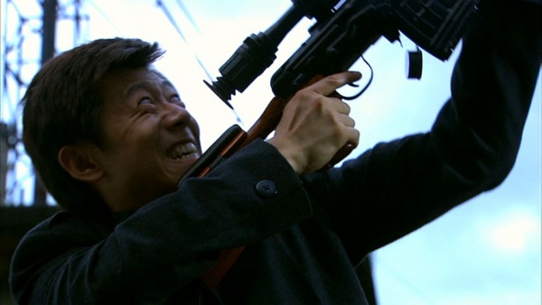 Luo Zai-Jun (Xia Yu) aims and fires his Dragunov at Yuet Song (Maggie Q)