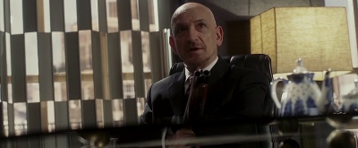 Ben Kingsley with a sawed-off double barreled shotgun as The Rabbi in