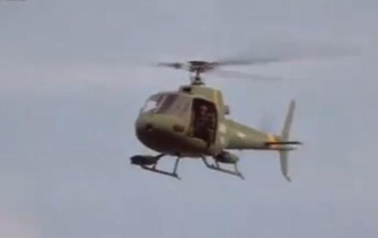 An angled view of the chopper in the air.