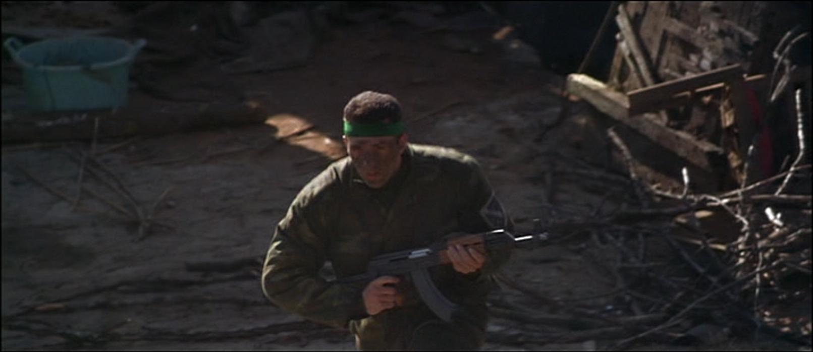 A Bosnian Soldier rushes with a Zastava M70AB2 before being killed by Guy.