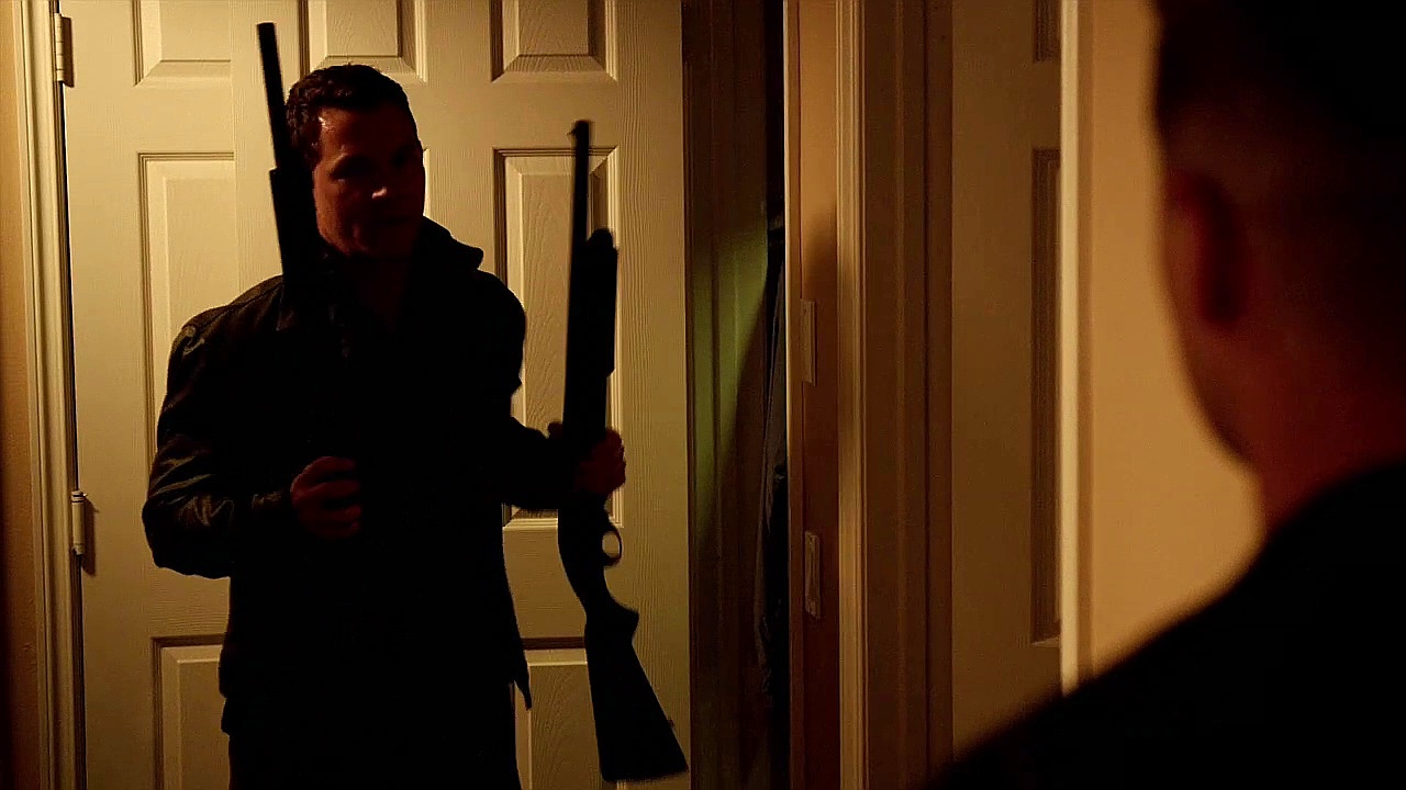 Officer Bryant removes two Remington 870's from his home gun safe and hands one off to Officer Sherman after he receives a gang threat in "Chaos" (S5E08).