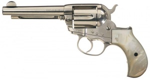 Colt Lightning, similar to the one used by Val Kilmer in Tombstone, with a full-length ejector rod housing.