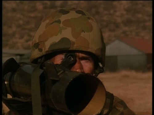 An Australian exchange sergeant prepares to fire a live LAW 80 at a Makindi militia truck in "Baptism of Fire" (Season 5, Episode 14).