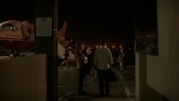 Two Israeli soldier patrol a runway at Ben Gurion Airport (S11E02).