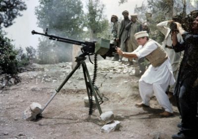 that is the real Charlie Wilson firing a DshK