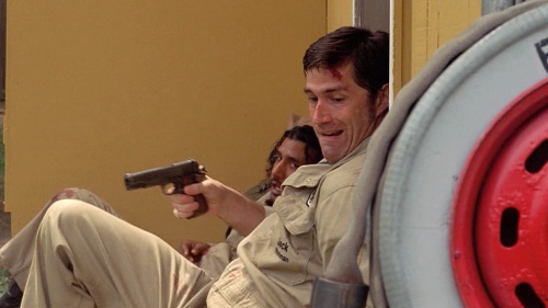 Matthew Fox as Jack holding a 1911A1 in Lost.