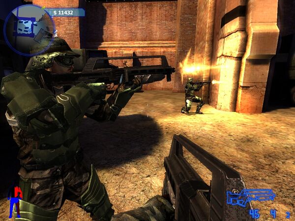 Max Balding (Yes, that's his name) holds the FAMAS-like Rifle as he obseves an NPC firing it.