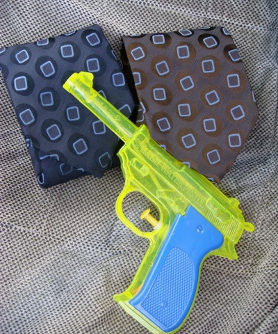 Splashinator Water Pistol (a yellow version with blue grips)